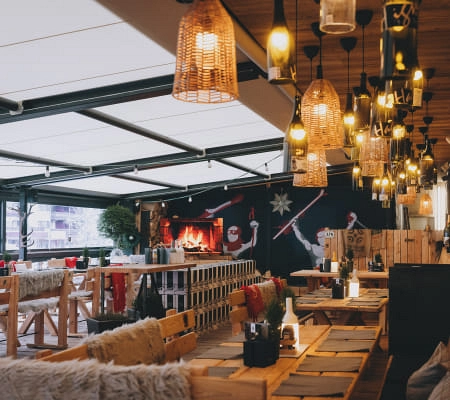 Cozy interior with lights and Christmas decorations.