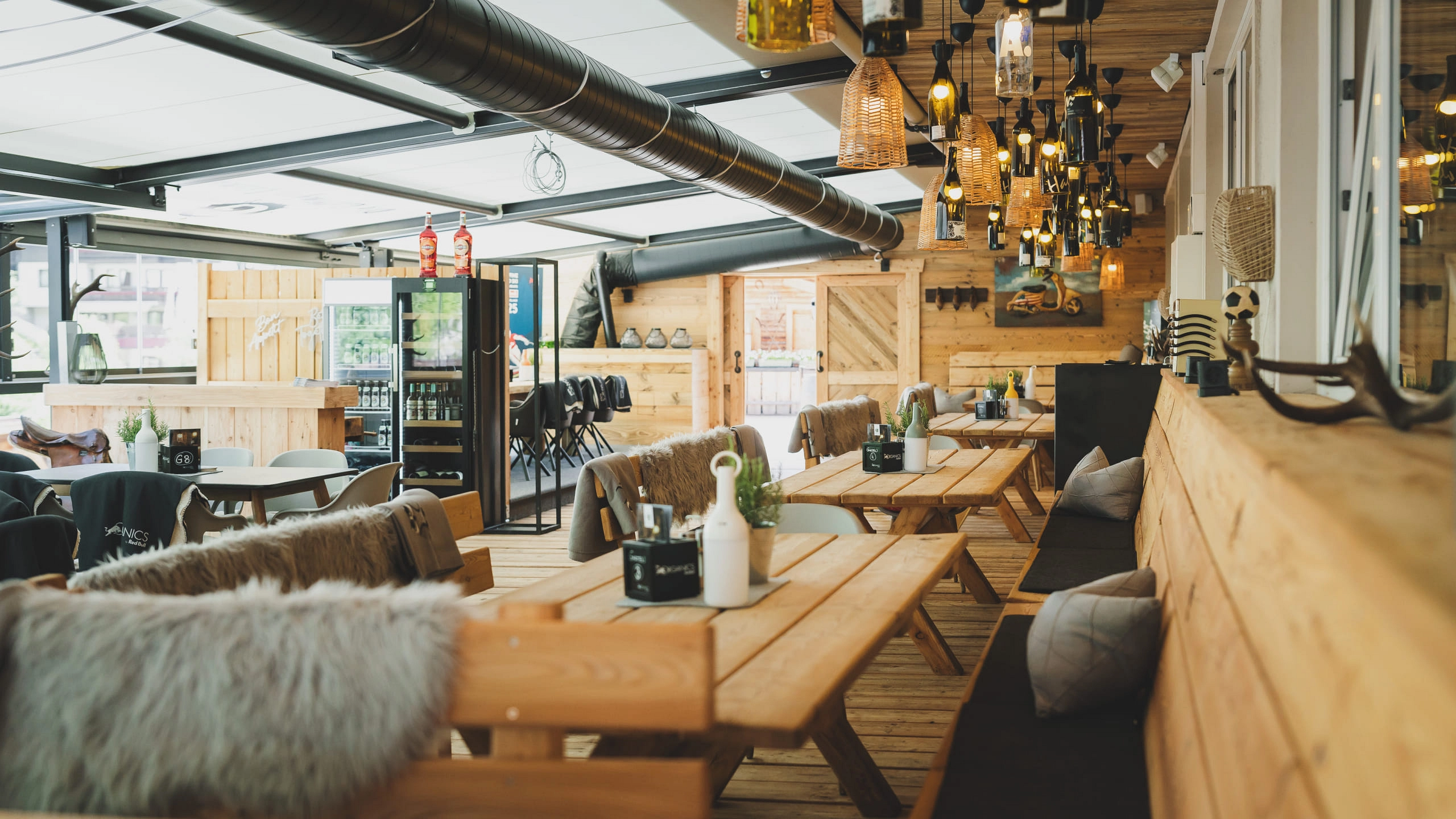 Cozy interior of a modern cafe with wooden tables and decor